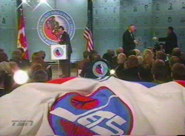 Dale Hawerchuk approaches the podium to make his induction speech