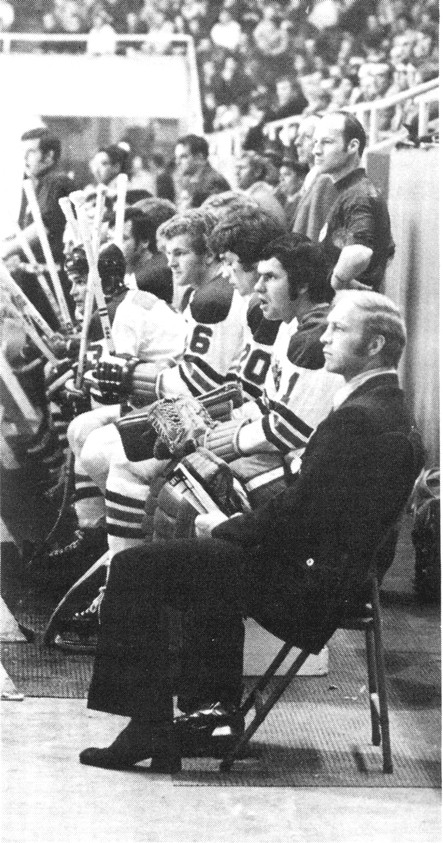 Coach Bobby Hull watches his team