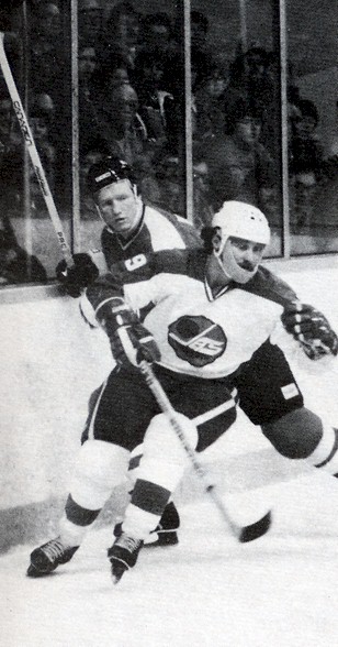 Doug Smail in action wearing a guard to protect his broken jaw